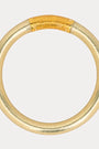 Gold bracelet on a white background