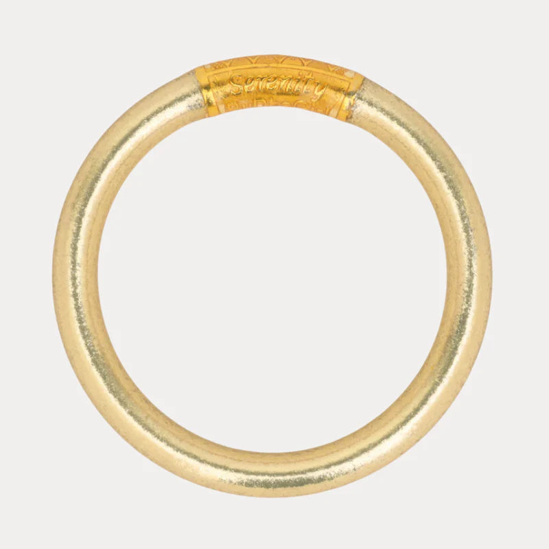 Gold bracelet on a white background