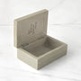 Wooden box with a lid on a white background