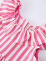 Pink and white striped dress on a light gray background