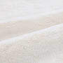 Close-up of textured white fabric
