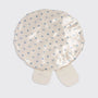 Beige fabric cover with blue patterns on a white background