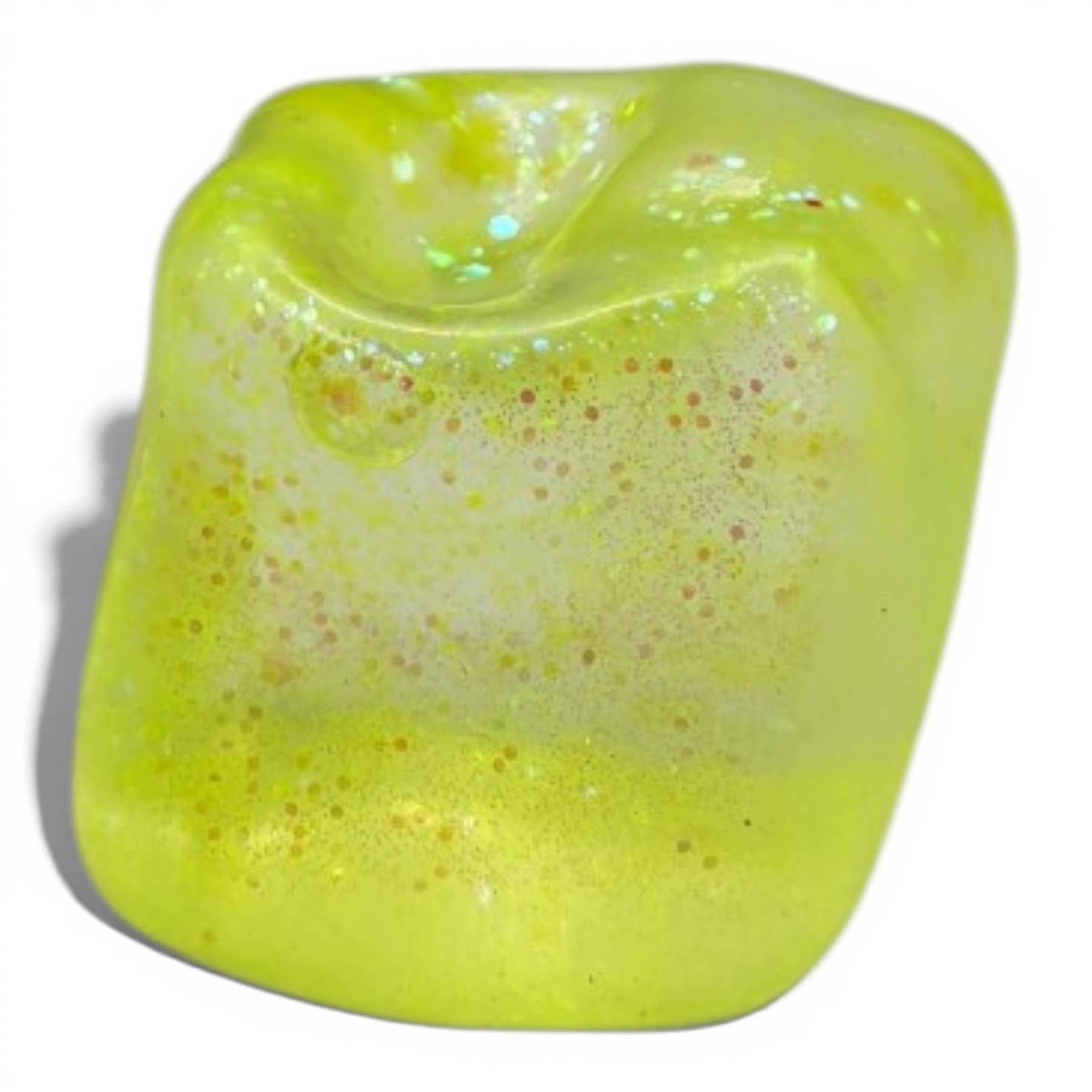 Yellow glittery block on a white background
