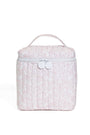Pink textured lunch box with a white handle on a white background
