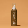 Brown bottle of PETAJANE tanning mousse on a beige background