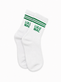 White crew socks with green stripes and Lulu Mac logo, single pair