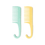 Two combs, one green and one yellow, on a white background