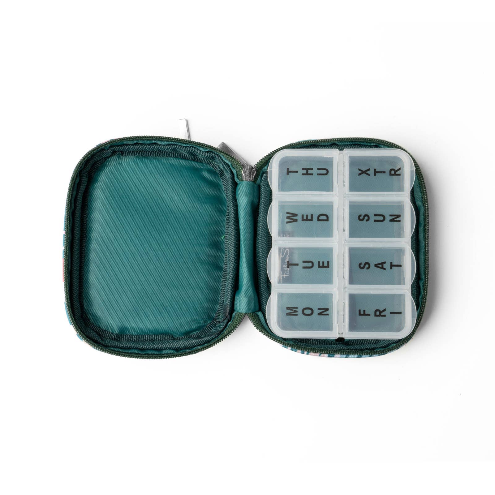 Green pill case with weekly compartments on a white background