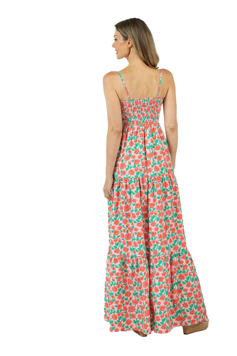 Woman wearing a floral dress on a white background