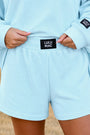 Ice blue waffle knit shorts with elastic waistband and LULU MAC logo patch