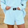 Ice blue waffle knit shorts with elastic waistband and LULU MAC logo patch
