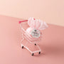 Small shopping cart with a pink bow and 'sweet grace' label on a pink background