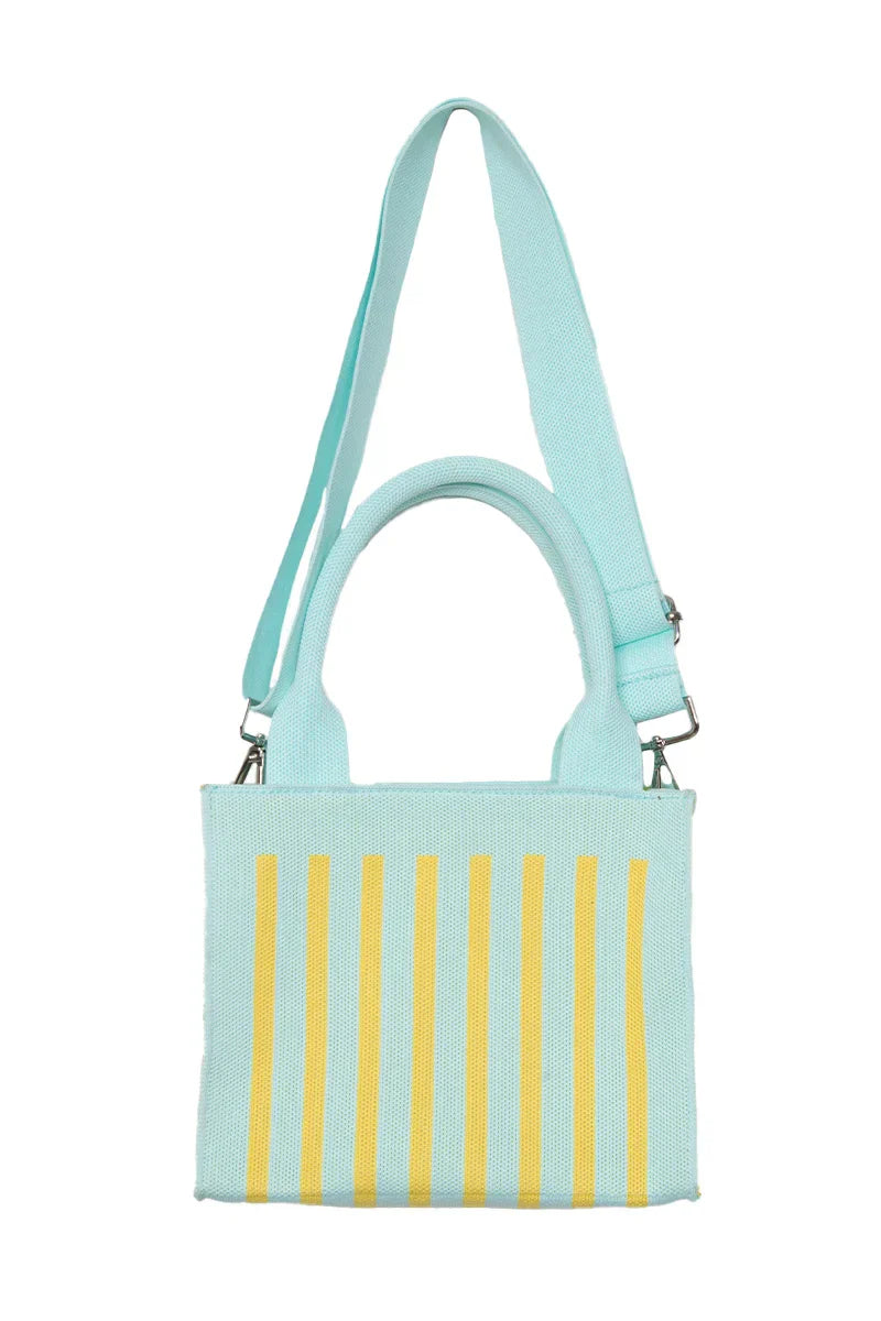 Light blue handbag with yellow stripes on a white background