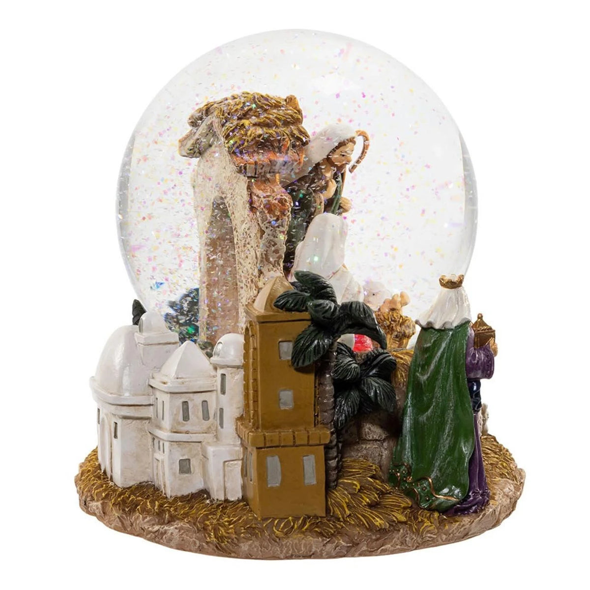 Nativity scene snow globe with figures and architecture inside a transparent sphere.