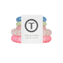 Set of colorful hair ties with a Teleties branded card on a white background