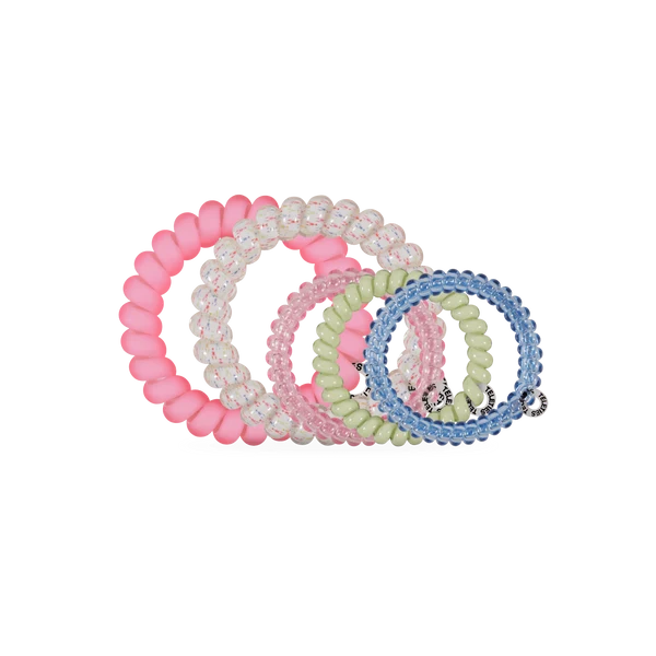 Set of colorful beaded hair ties on a white background