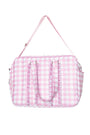 Pink gingham patterned bag with a strap on a white background