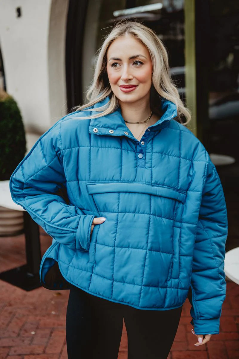 Lady in blue puffer jacket pullover 