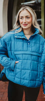 Lady in blue puffer jacket pullover 