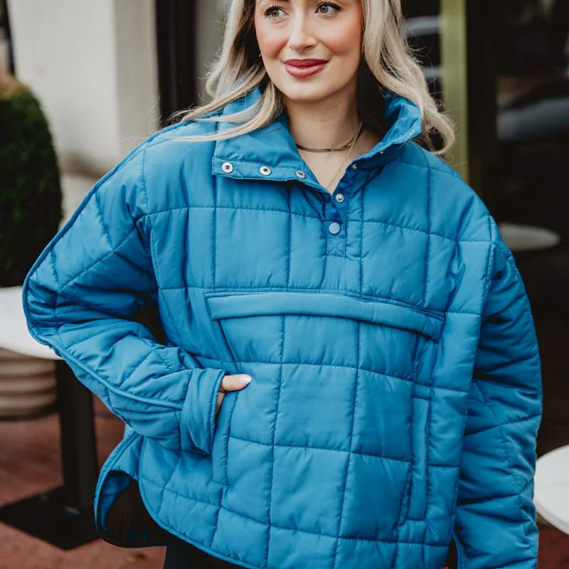 Lady in blue puffer jacket pullover 