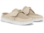 Beige slip-on shoes with bow details on a white background
