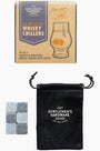 Whisky chiller set with stones, glass, and pouch on a white background