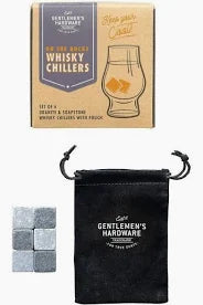 Whisky chiller set with stones, glass, and pouch on a white background