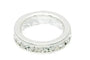 Silver ring with embedded crystals on a white background