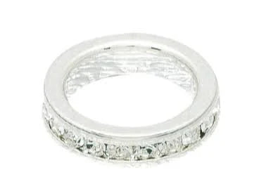Silver ring with embedded crystals on a white background