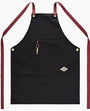Black apron with red straps on a white background