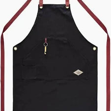Black apron with red straps on a white background