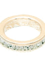 Gold ring with green gemstones on a white background