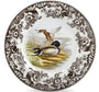 Decorative plate with a duck design and floral patterns