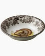 Decorative ceramic bowl with floral patterns on a white background