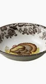 Decorative ceramic bowl with floral patterns on a white background