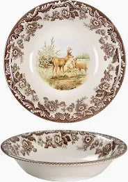 Decorative ceramic plate with deer design and matching bowl below.