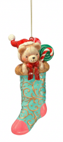 Resin bear stocking ornament in teal with red ribbon and teddy bear face