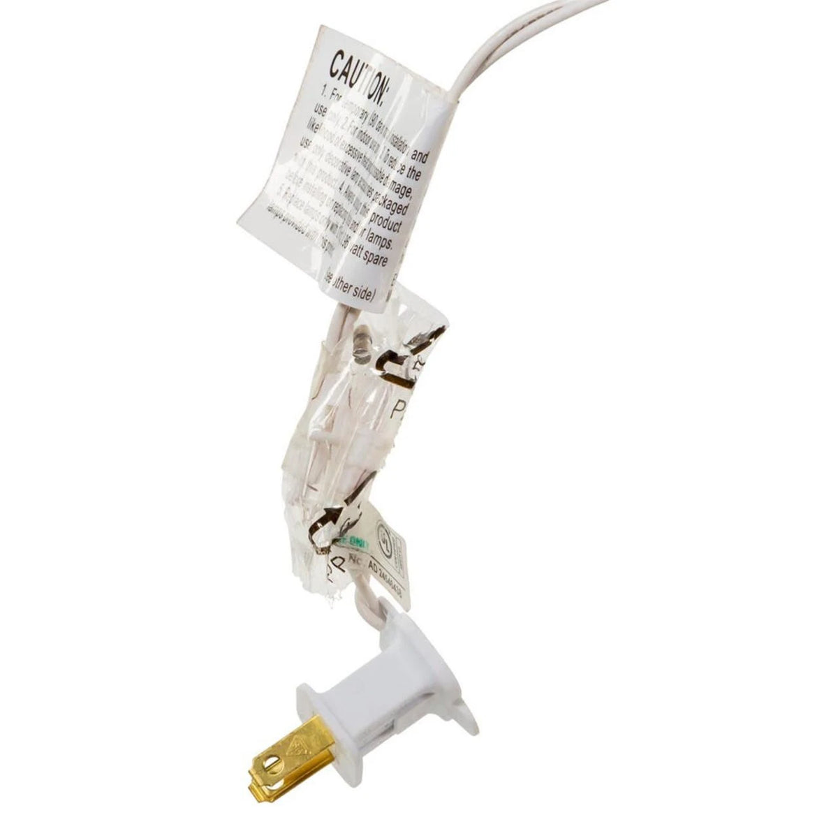 A single white electrical light fixture connector with a gold-toned plug base, attached to a white cord and a small printed caution label, isolated on a white background.