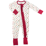 A baby long-sleeve footed sleeper with a white base, decorated with small red and green holiday motifs, featuring red cuffs, a red front zipper, and red ankle cuffs.