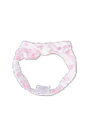 Pink floral headband on a white background