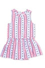Pink dress with white polka dots on a white background