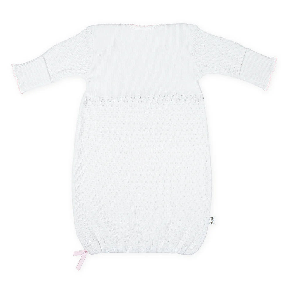 White baby gown on a white background