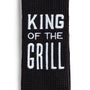 Black towel with 'King of the Grill' text on a white background