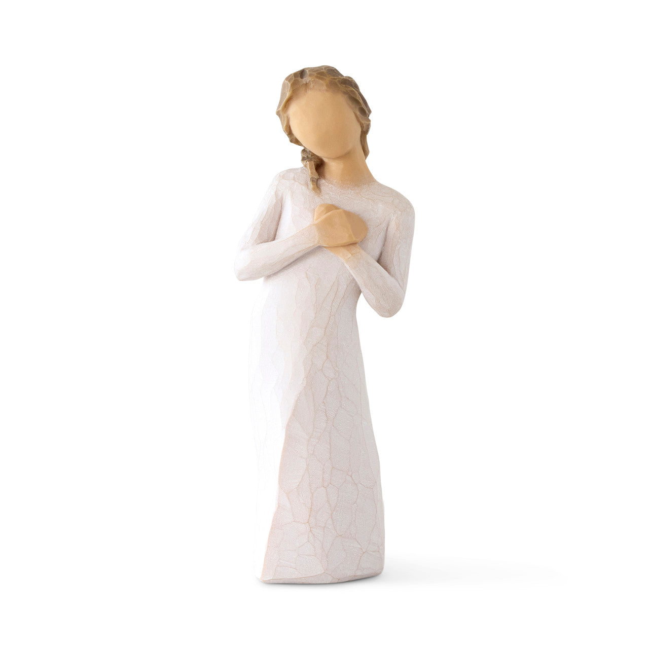 Statue of a woman in a white dress holding her hands to her chest on a white background